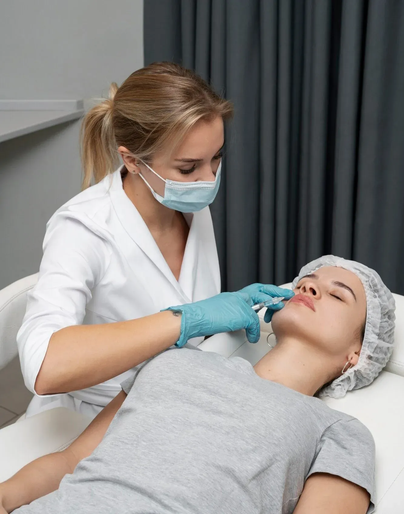 Aesthetic provider performing a facial injection